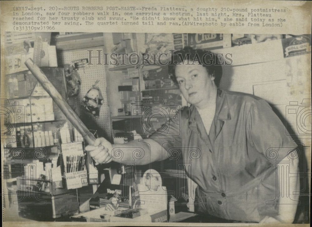 1966 Freda Platteau  the Postmistress saw four robbers walk in - Historic Images