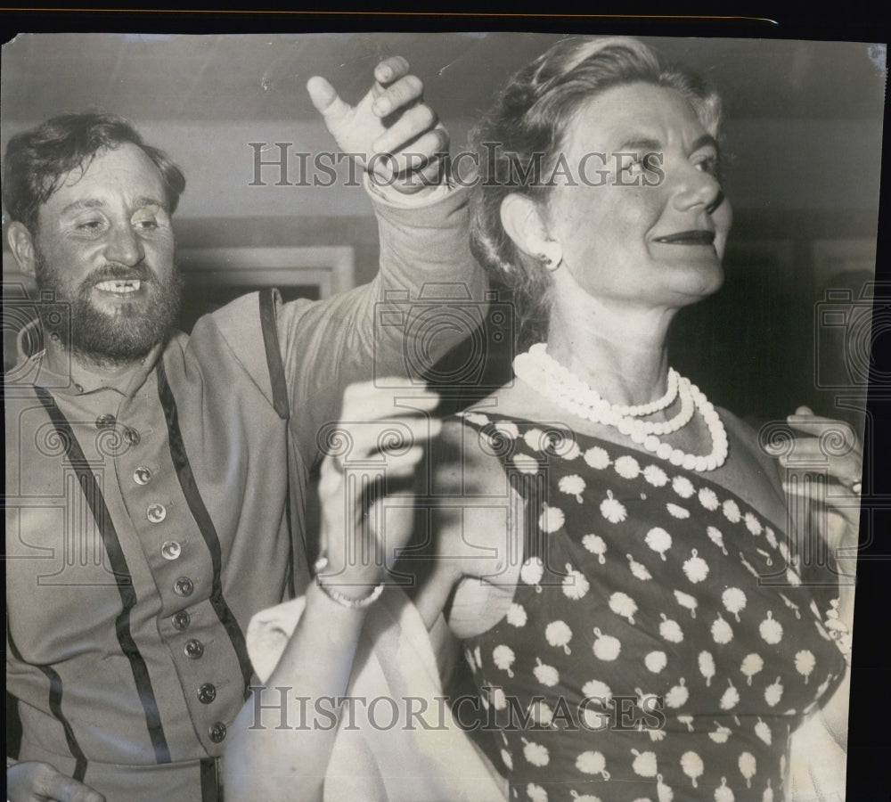 1957 Joe Powell givees Betty Buchan a twirl around the dance floor - Historic Images