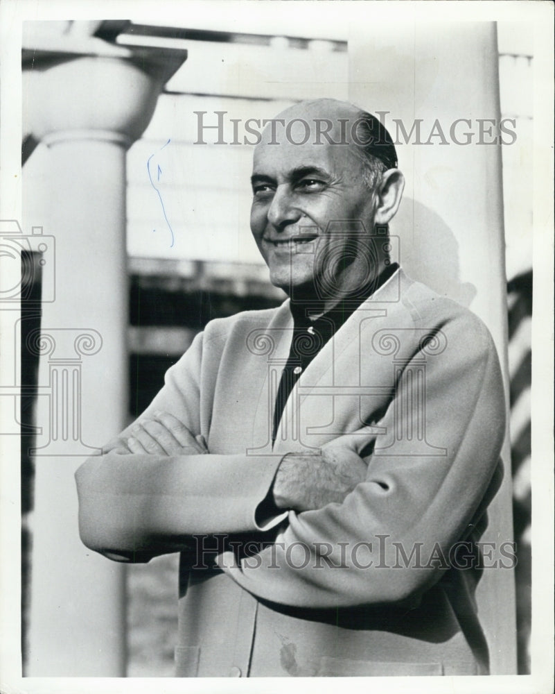 1974 Sir George Solti, conductor, posing for camera. - Historic Images