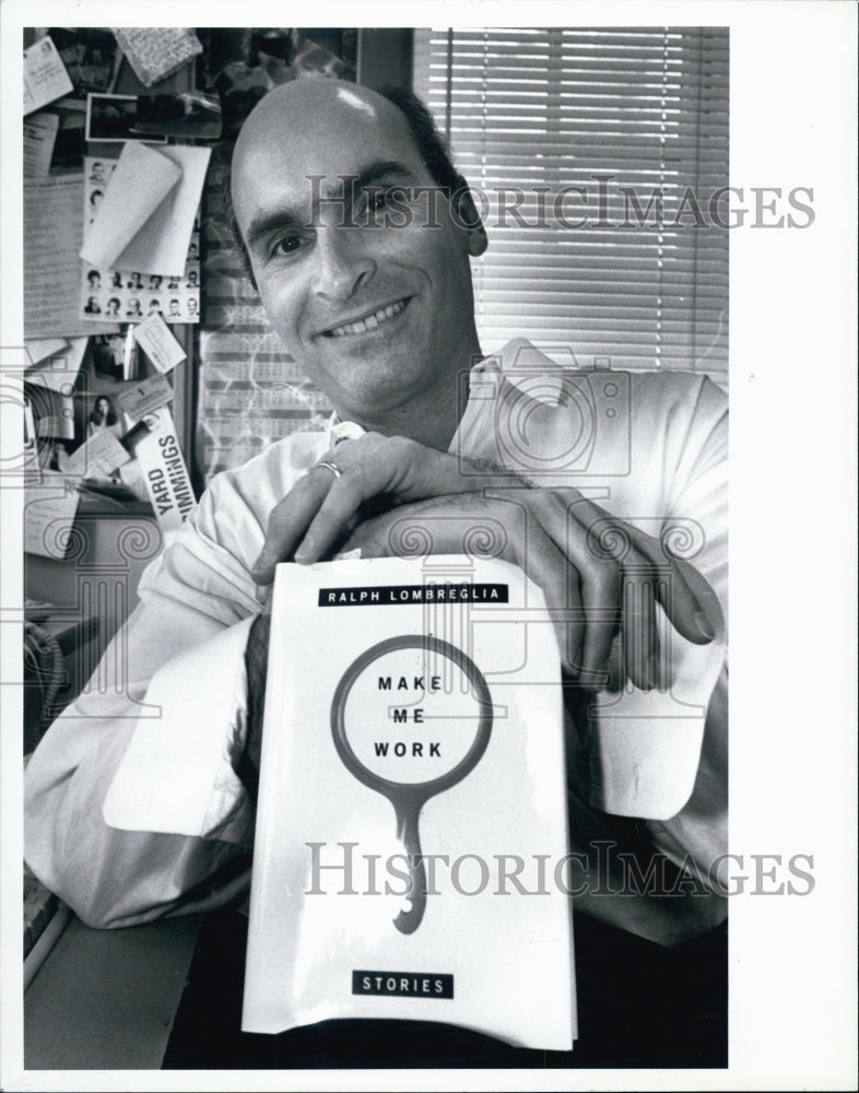 1994 Press Photo Ralph Lombreglia with his book. - Historic Images