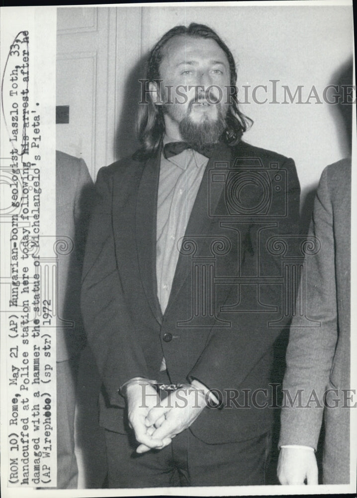 1972 Geologist Laslo Toth in police station after his arrest - Historic Images