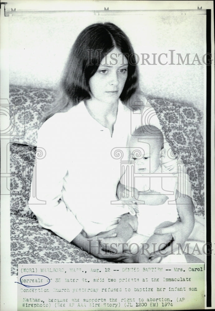1974 Mrs. Carol Morralem who refused to baptize her baby because she - Historic Images