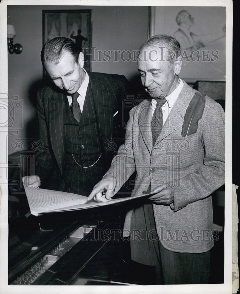 1945 Dr. Serce Koussevitsky Looks at Music Score - Historic Images