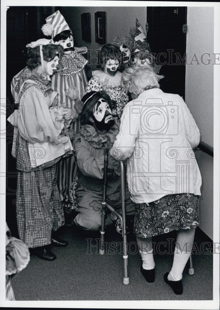 Press Photo Group called the Holy Fools entertains patients at the Carrie Post - Historic Images