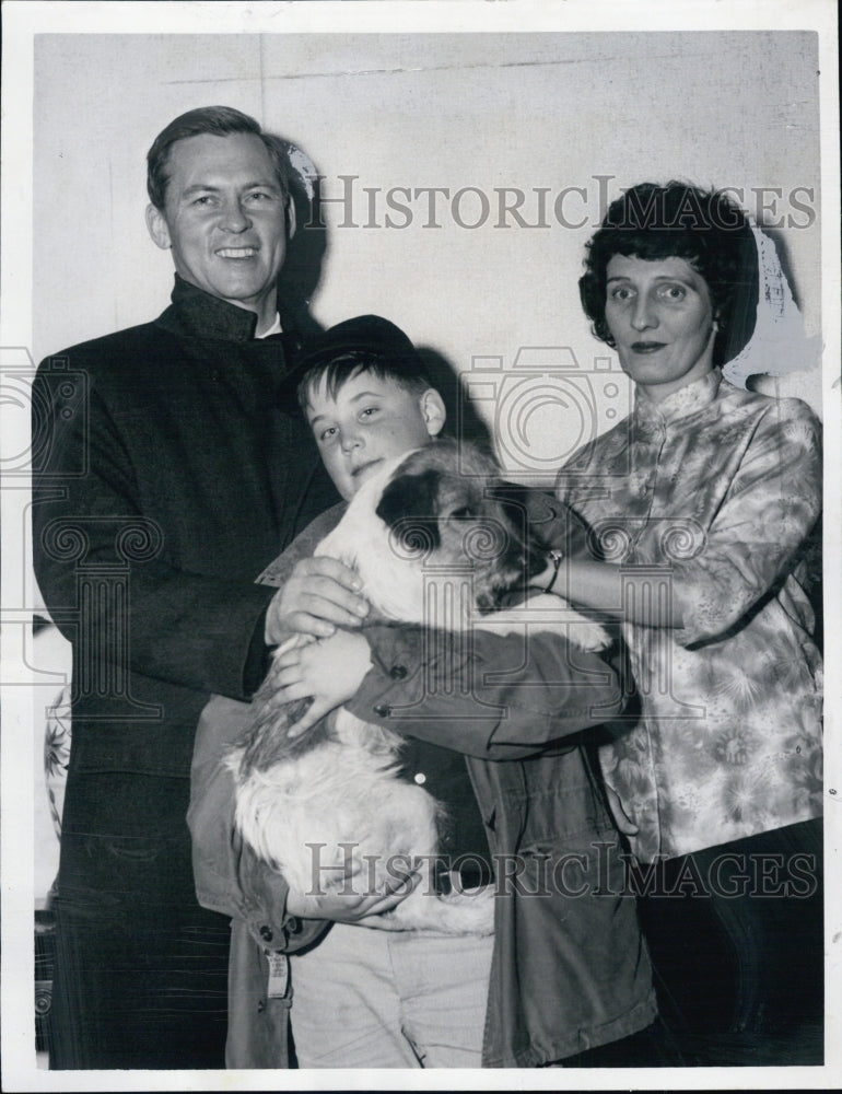 1966 Bobby Peabody, son of former Gov. Enidicott, hold family pet - Historic Images