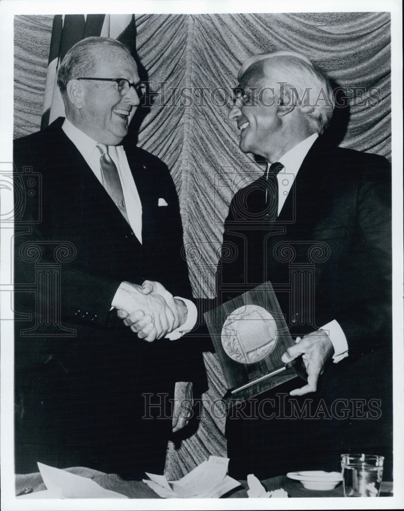 1968 Dr. Norman Vincent Peale congratulates Joseph Timan. - Historic Images