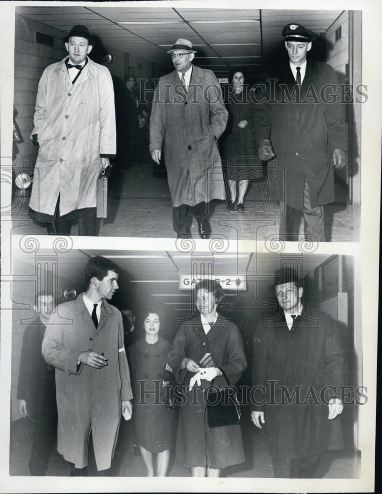 1964 Capt Alan Wall leaves airport with passengers - Historic Images