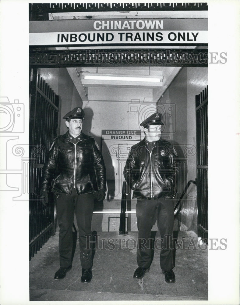 1987 Press Photo MTBA Officers Joseph Mastrorilliand Edward O'Malleyin Chinatown - Historic Images