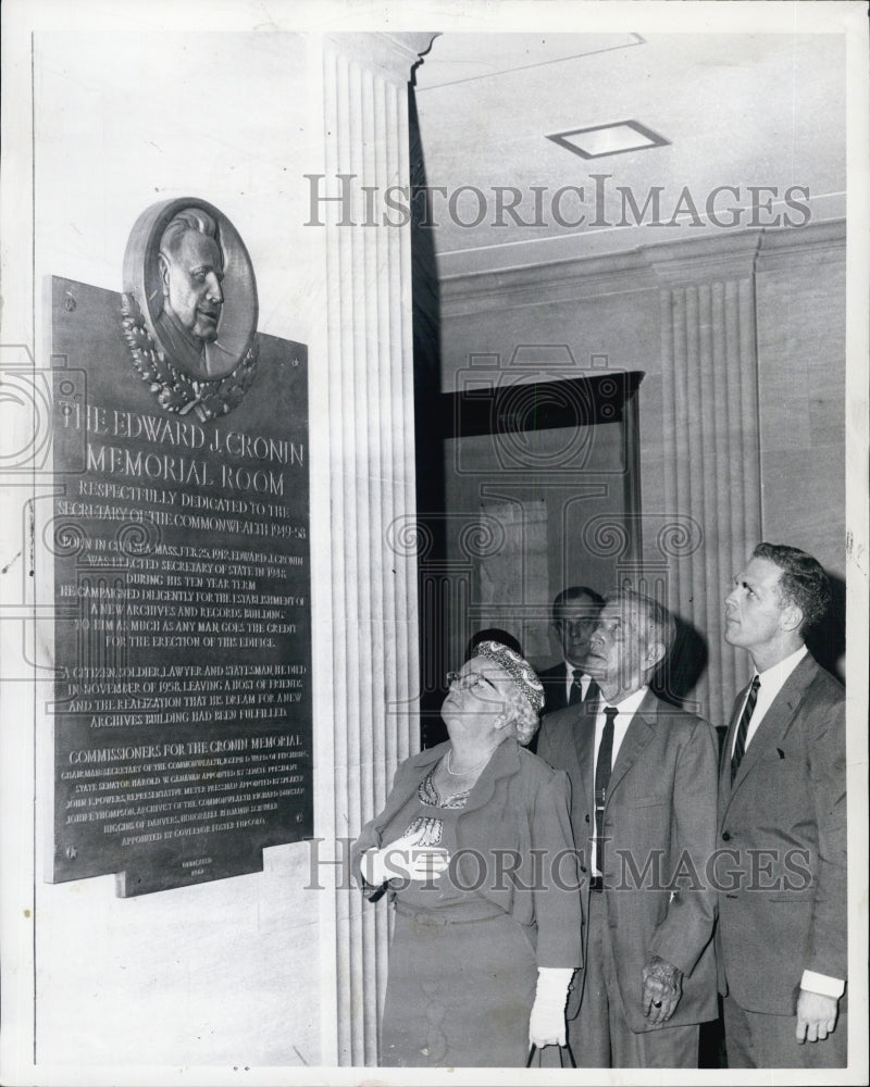 1961 people looking at memorial plaque for Edward Cronin - Historic Images