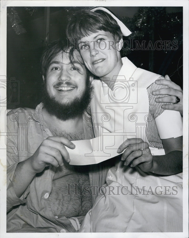 1967 Press Photo Edward Krugman presents $830,000 check to Marcia Morton - Historic Images