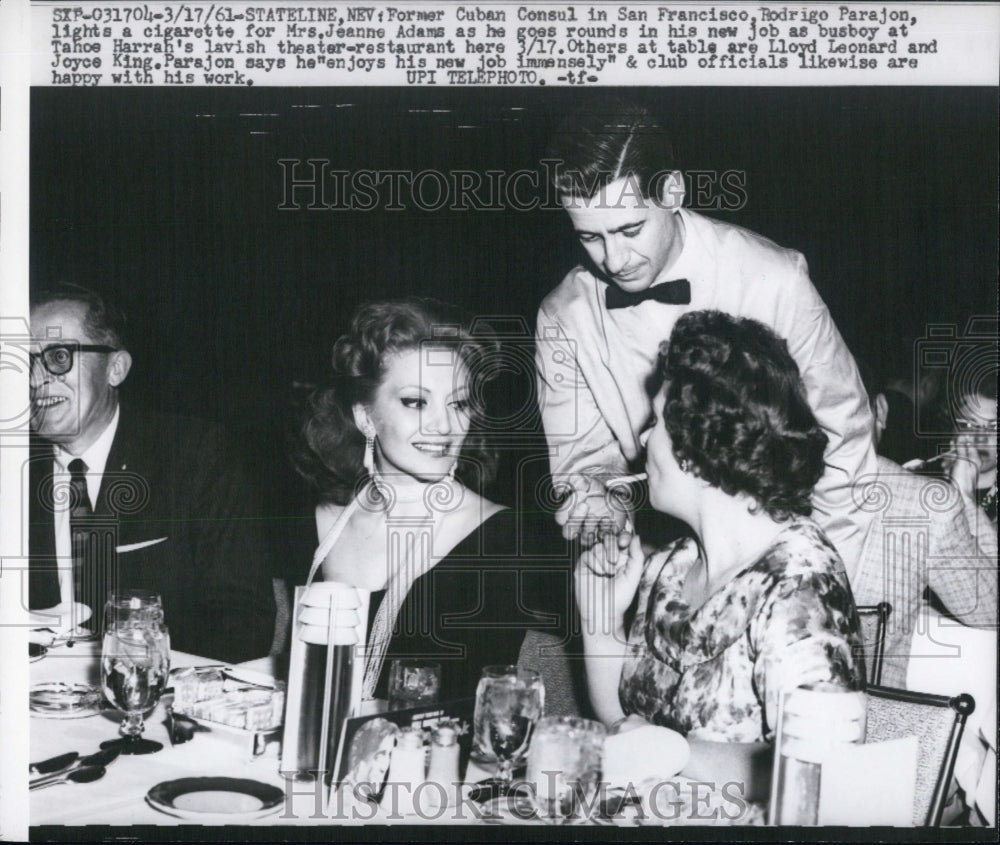 1961 Former Cuban Consul Rodrigo Parajon works as busboy at - Historic Images