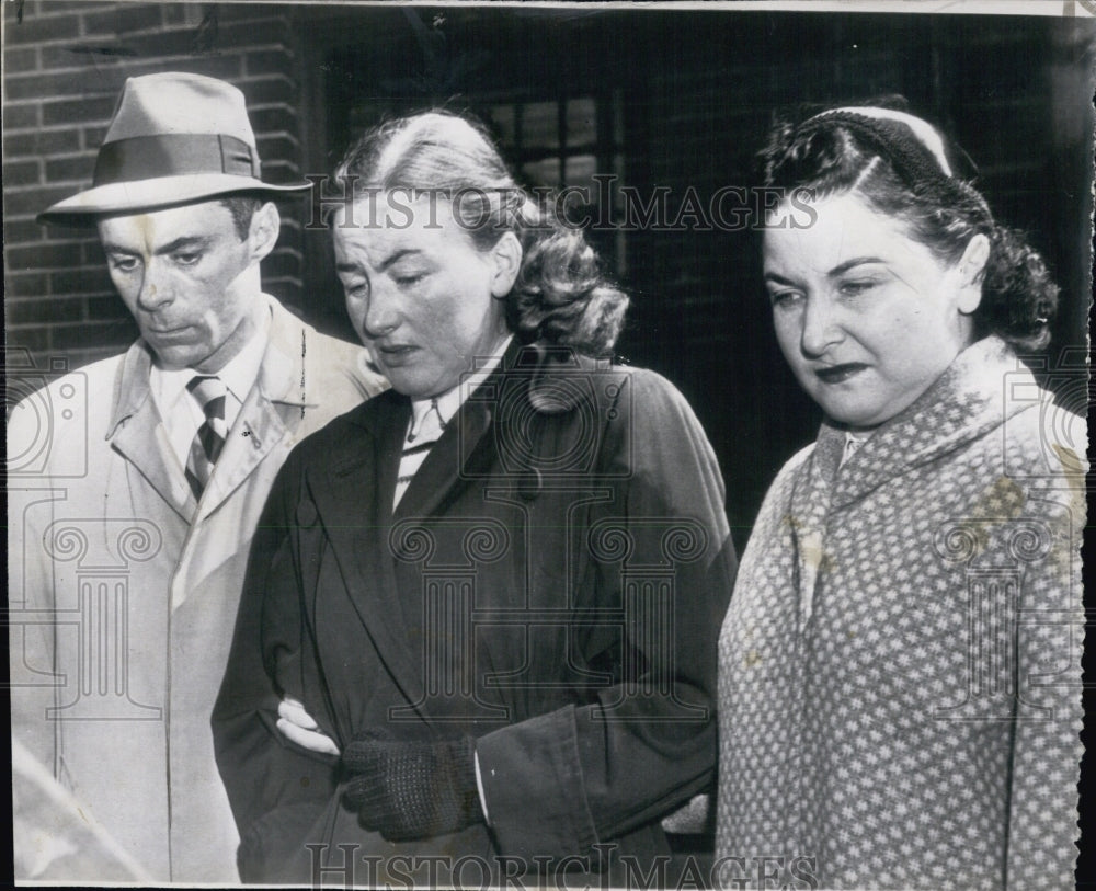 1953 Hildegarde Pelton arrested in the slaying of her husband - Historic Images