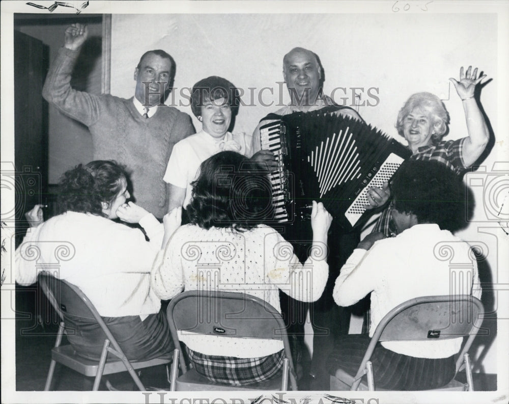 1966 George Pelham, Grace Mullaney, Dom Ciarano Sing at Party - Historic Images