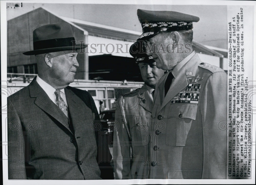 1959 Pres. Eisenhower talks with Gen. Thomas White - Historic Images