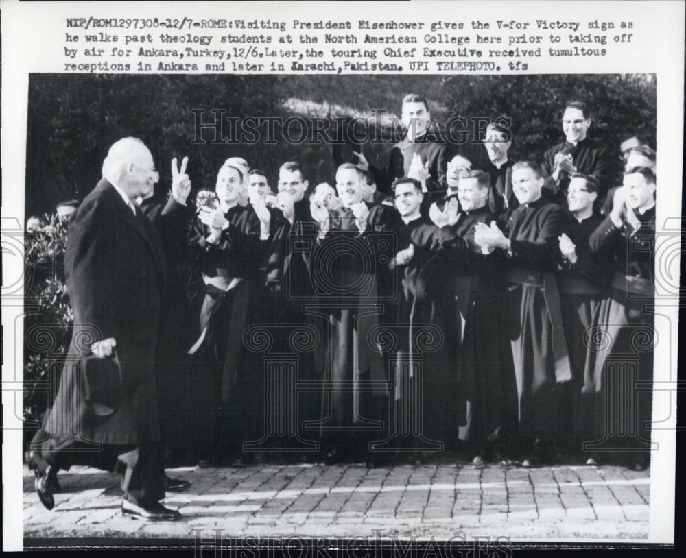 1959 President Eisenhower gives the V-for Victory sign to students - Historic Images