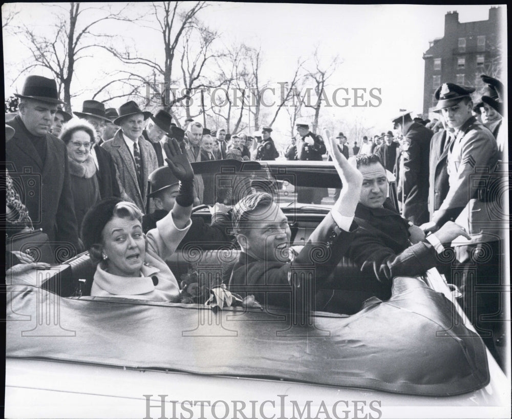 1965 Mrs. Toni Peabody and husband wave to crowd in a retirement cer - Historic Images