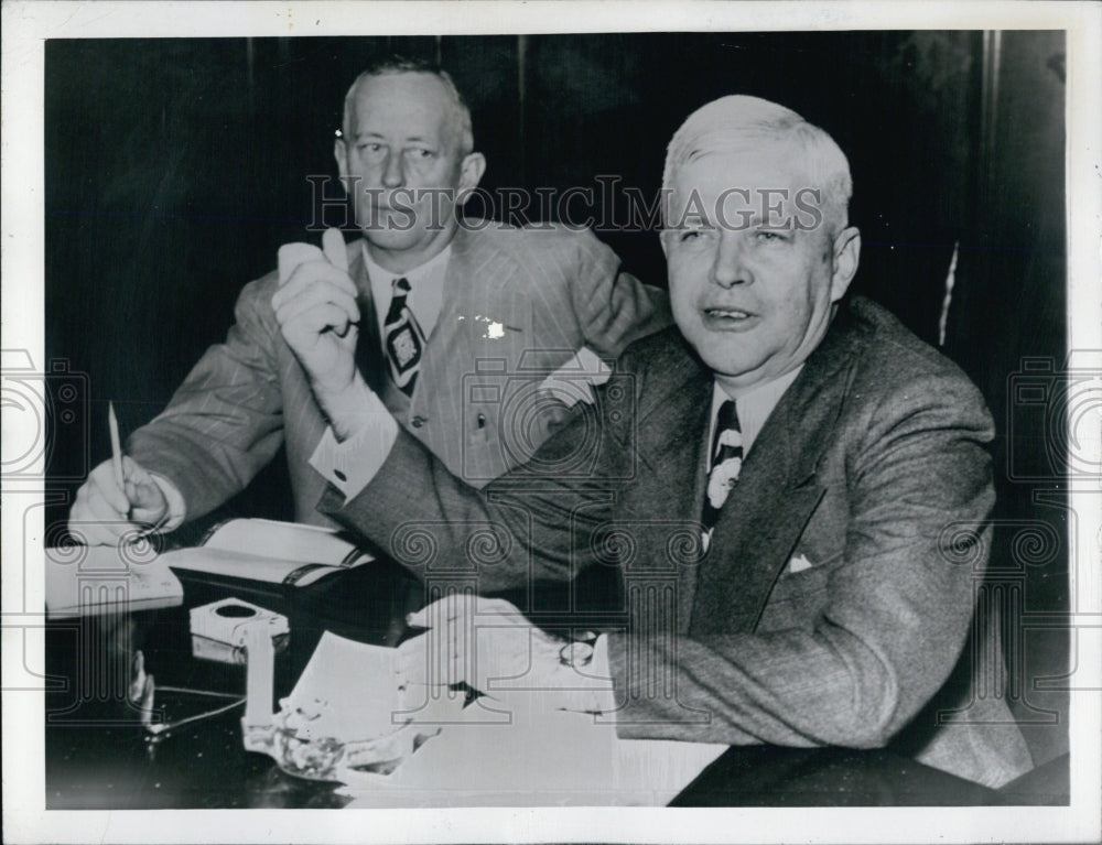 1945 Charles Wilson, president of GM with Harry Anderson, VP - Historic Images