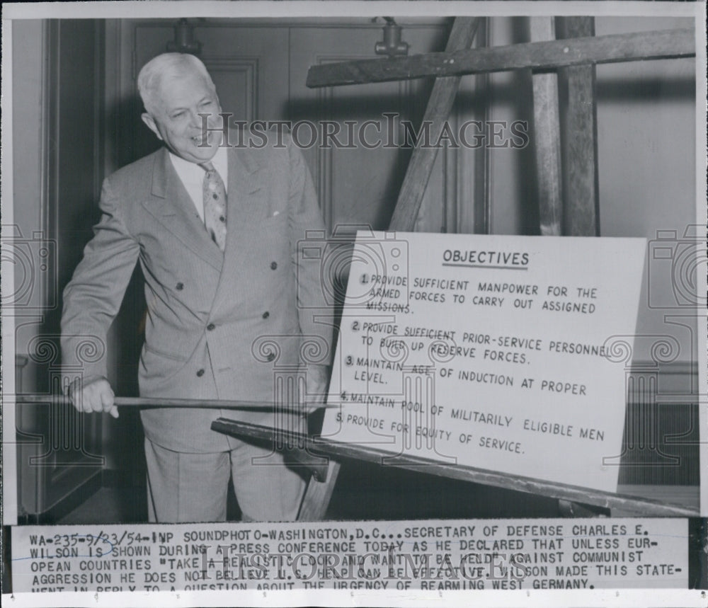 1954 Charles Wilson shown during a press conference - Historic Images