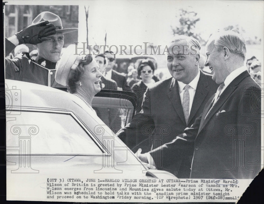 1967 Prime Minister Harold Wilson and wife of Britain greeted by-Historic Images