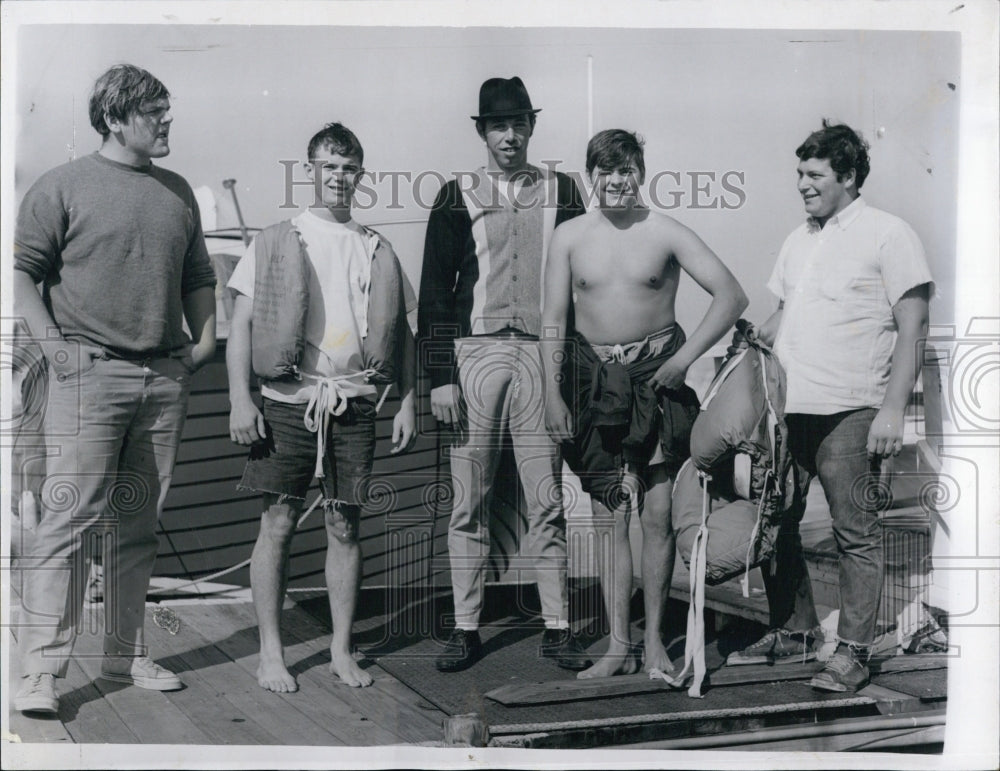 1968 Press Photo Survivors of Boat Fire Cabin Cruiser in Boston Harbor Marina - Historic Images