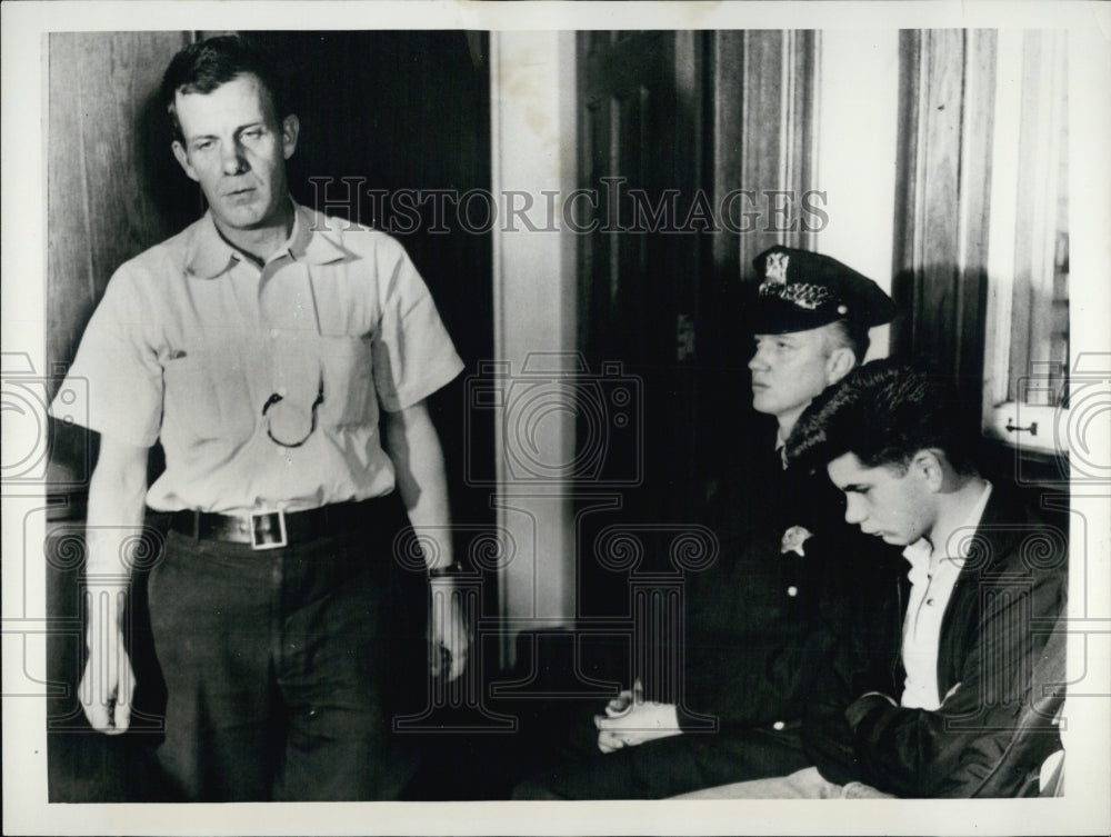 1956 Press Photo Thomas McKiernan passes by his son who killed his wife. - Historic Images