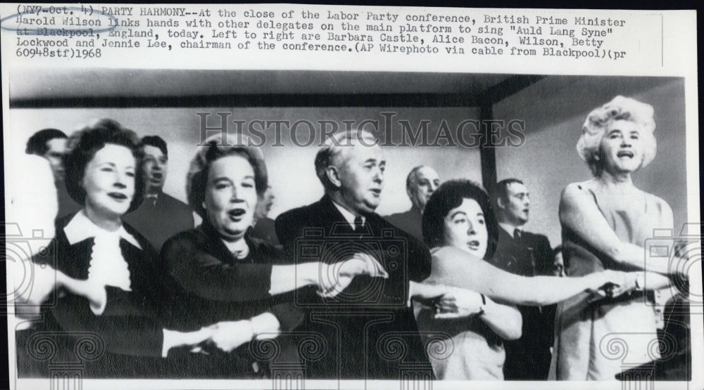 1968 British Prime Minister Harold Wilson sings &quot;Auld Lang Syne&quot; wit - Historic Images