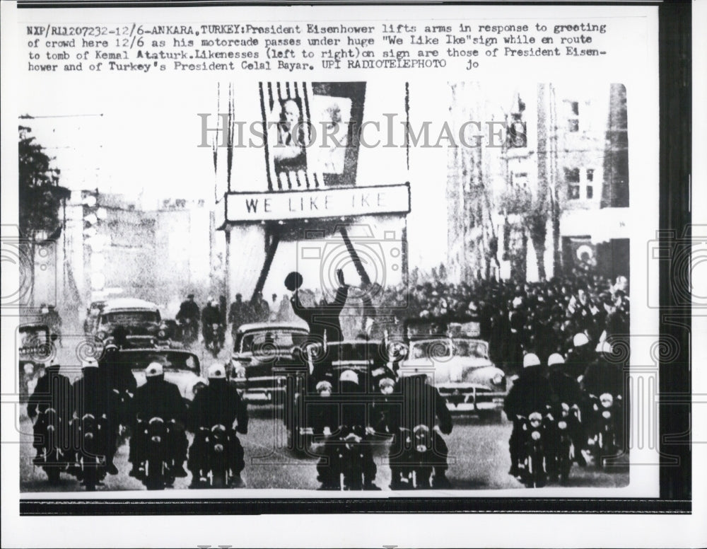 1959 Pres.Eisenhower lifts arms to greet the crowd - Historic Images