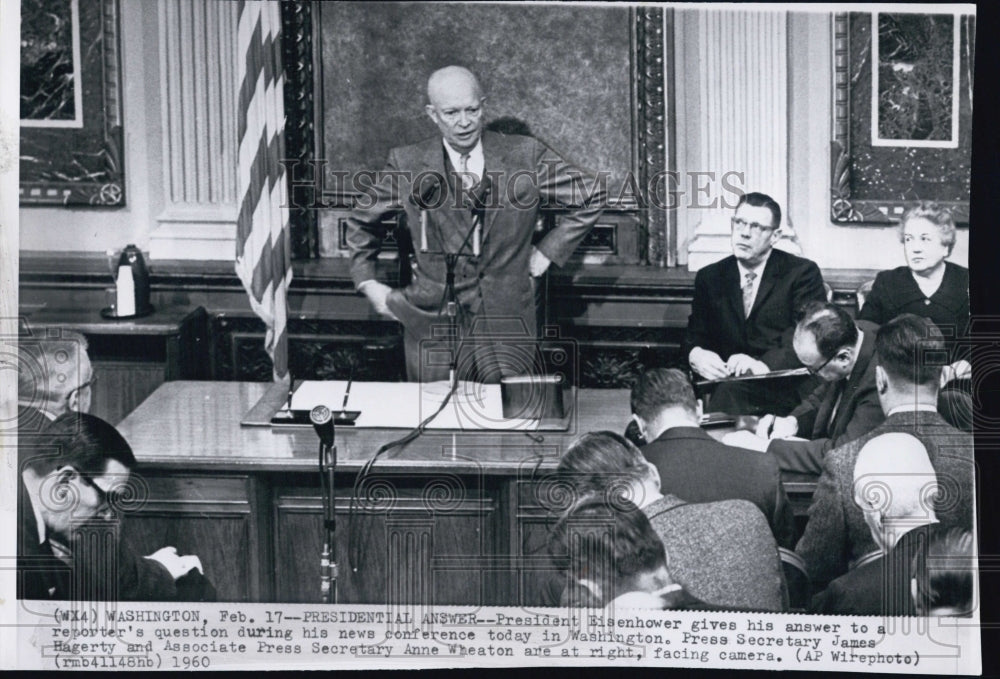 1960 President Eisenhower answers reporters questions - Historic Images