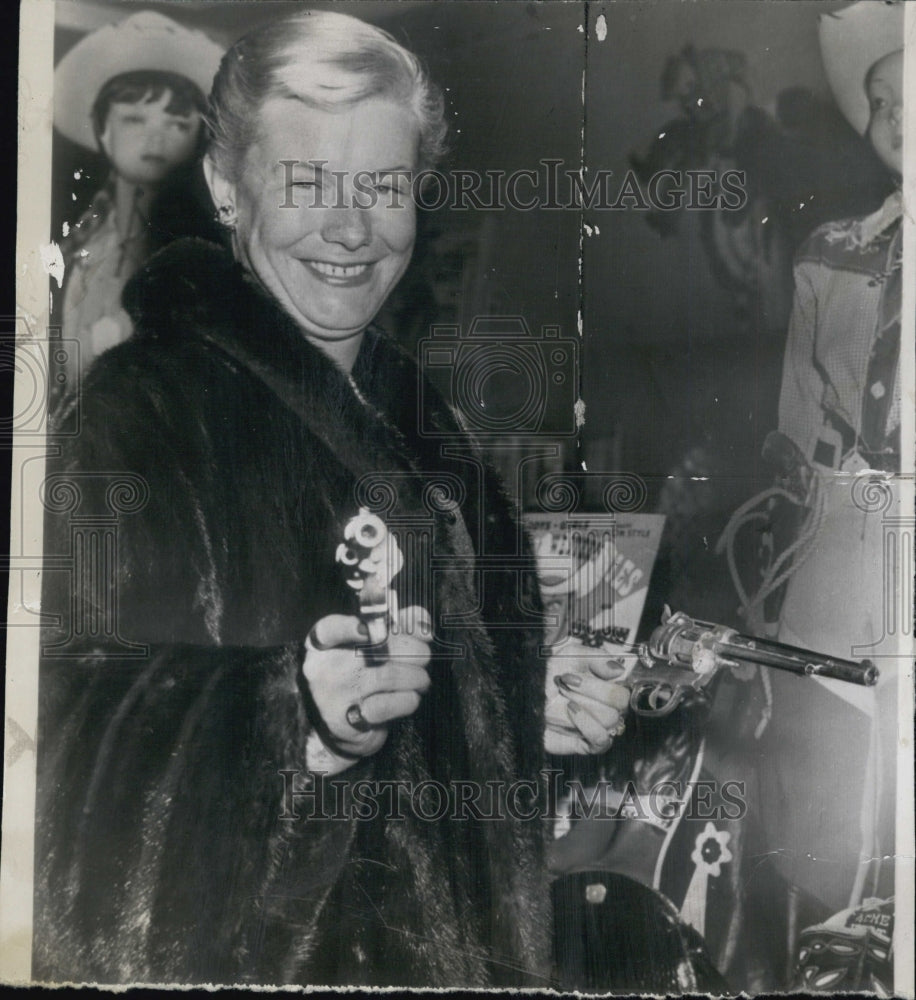 1955 French TV Producer Nicole Milinaire Shops for Toys - Historic Images