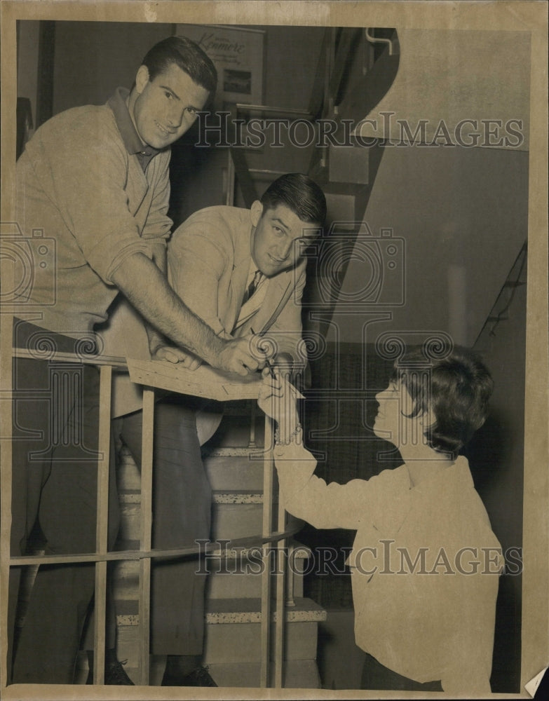 1964 Ann Sheinfeld Gets Autographs Of Butch Buchols And Barry MacKay - Historic Images