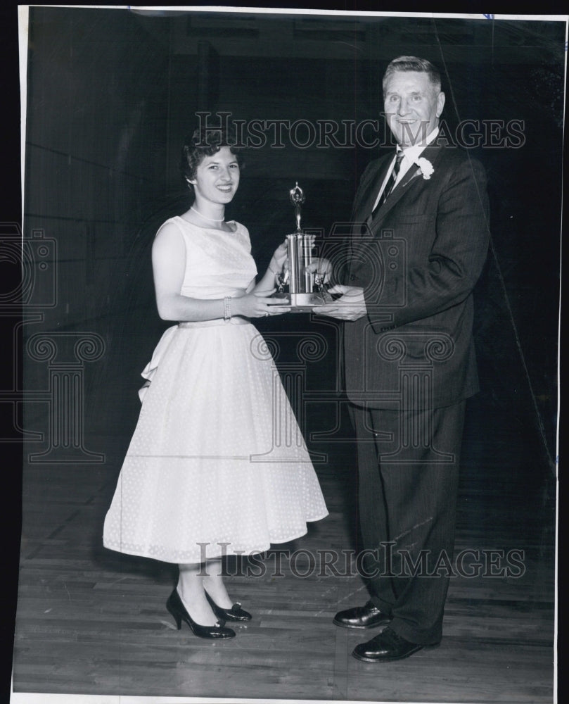 1963 Rachel Quintal recieving a award from John Sheehan - Historic Images