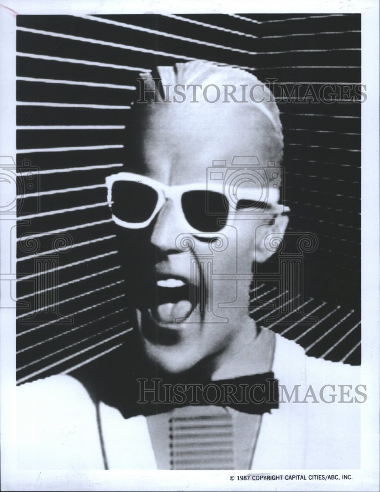 1987 Matt Frewer Stars as a TV Reporter in THE MAX HEADROOM STORY-Historic Images