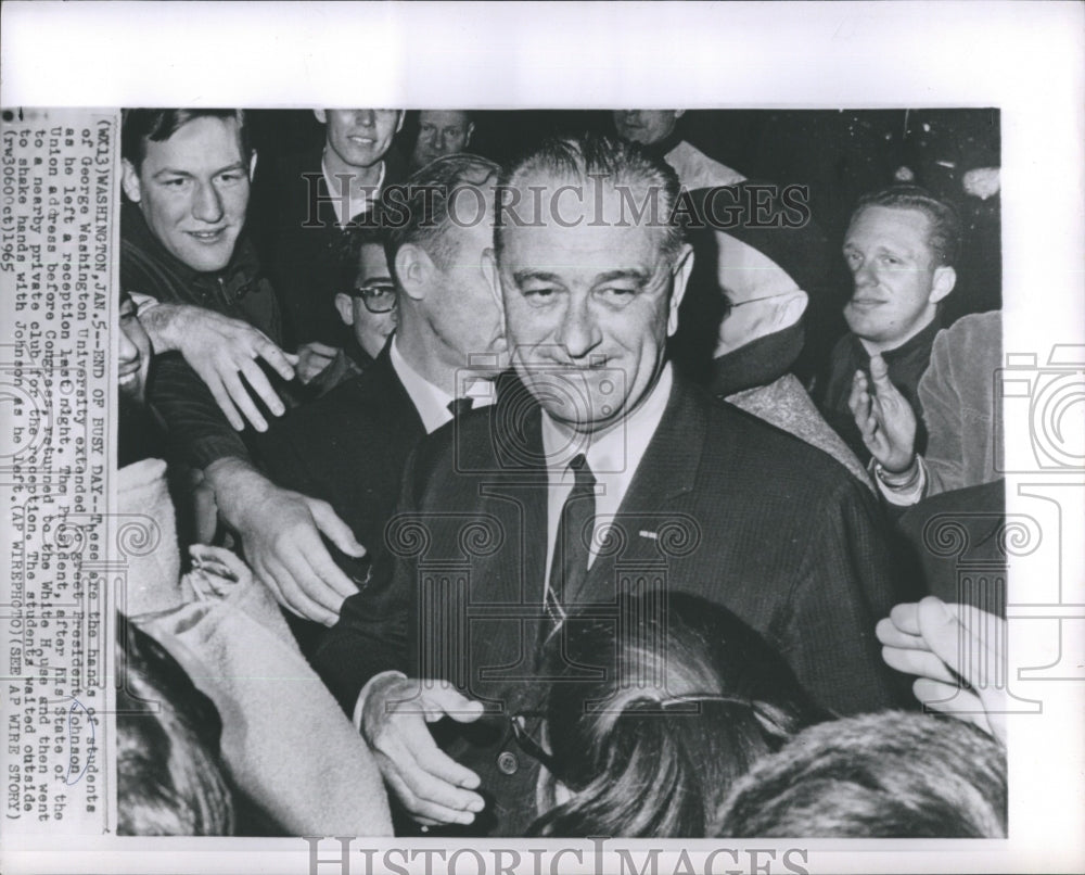 1965 Press Photo Hands is Students of George Washinton University to President - Historic Images