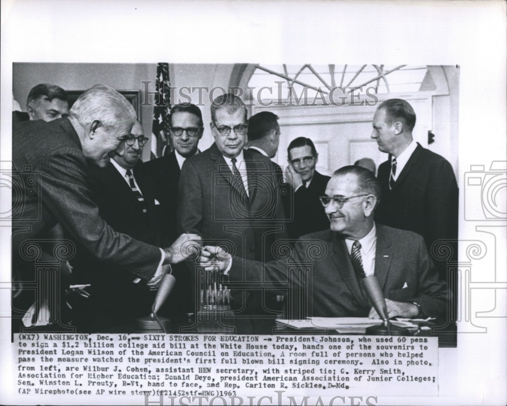 1963 Press Photo President Johnson, Who Used 60 Pens to Sign a $1.2 Billion Aid - Historic Images