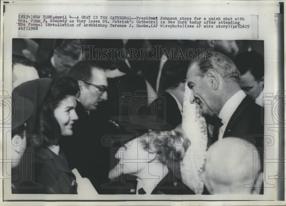 1928 President Johnson Stops for Quick Chat With Mrs. John F Kennedy - Historic Images