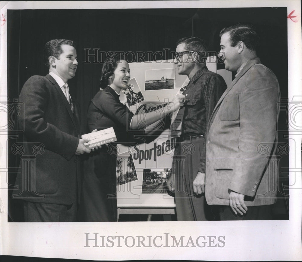 1958 Press Photo of Mrs. Dick Pope Jr. pinning Sportarama ribbon on Hervey Gresh - Historic Images