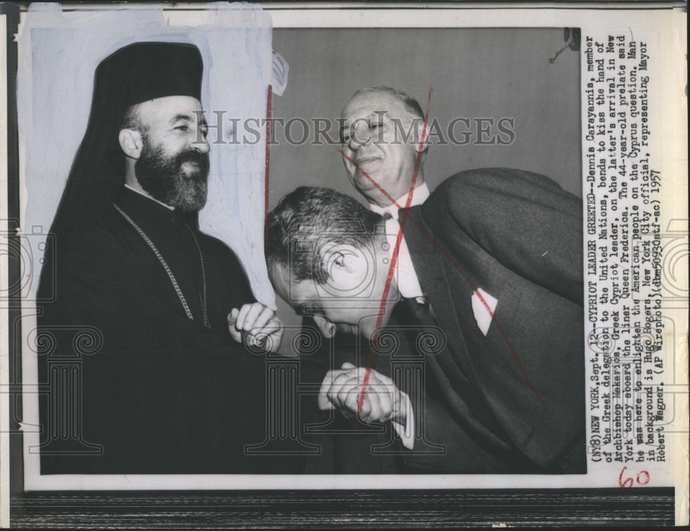 1957 Dennis Carayannis kisses Archbishop Makerios' hand-Historic Images