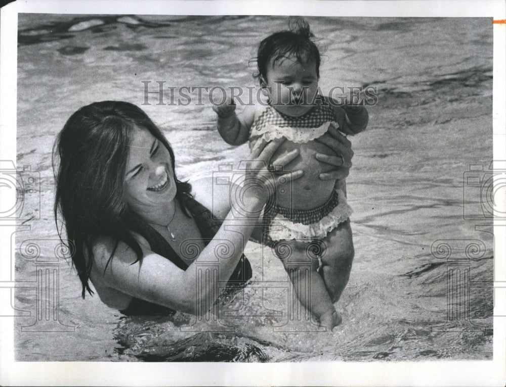 1973 Press Photo Mrs. G. W. Shear with Child at Beach on Coast Guard Day - Historic Images