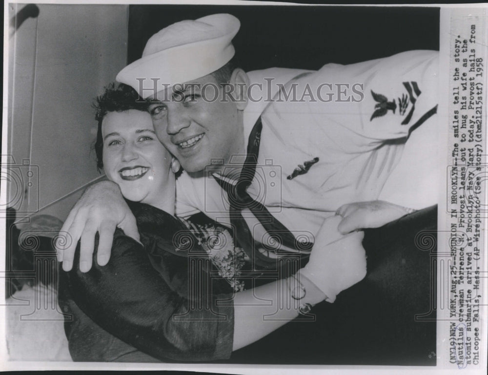 1958 Press Photo Submarine Crewman Reunited with Spouse - Historic Images