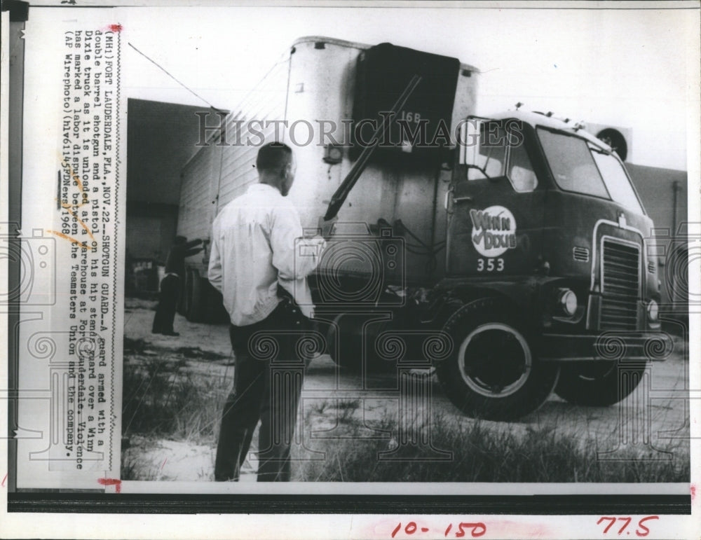 1968 Press Photo Guard Armed  with double barrel shotgun and a pistol on his hip - Historic Images