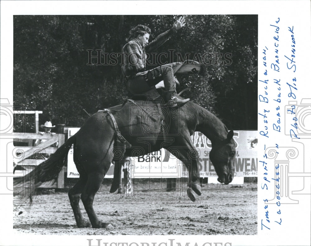 1989 Press Photo Rusty Buchanan And Lacoochee In Bareback Bronc Ride At Rodeo - Historic Images