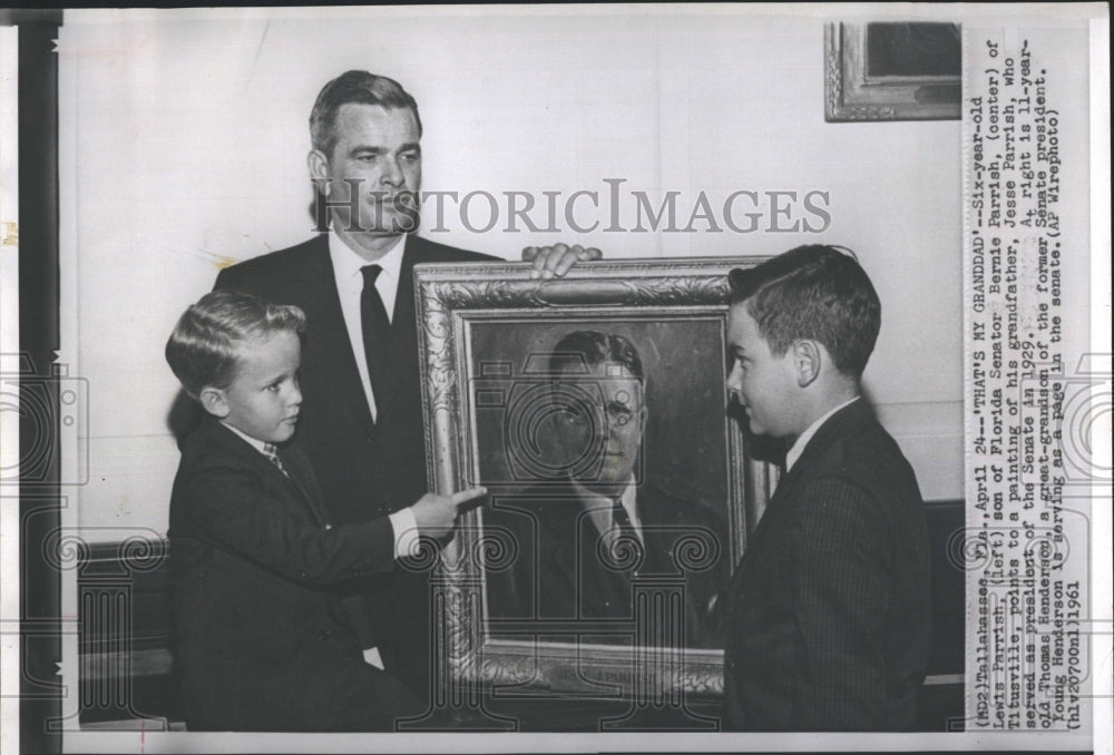 1961 Press Photo Lewis Parrish son of Florida Senator Bernie Parrish points to a - Historic Images