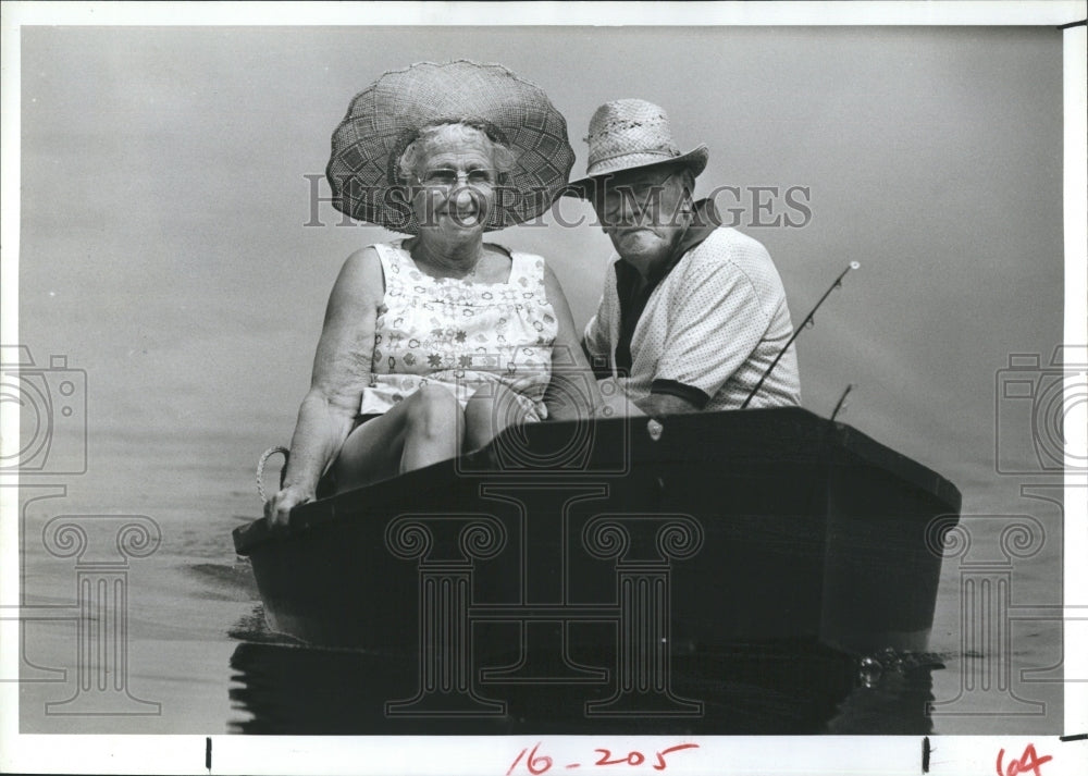 1984 Leon Belcher, wife Edith on his boat.-Historic Images