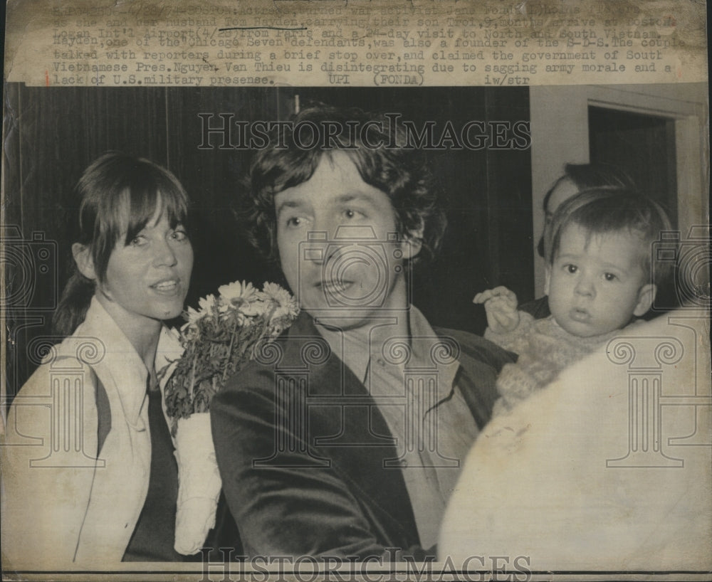 1974 Tom Hayden arrives at Boston&#39;s Logan Airport with his family.-Historic Images