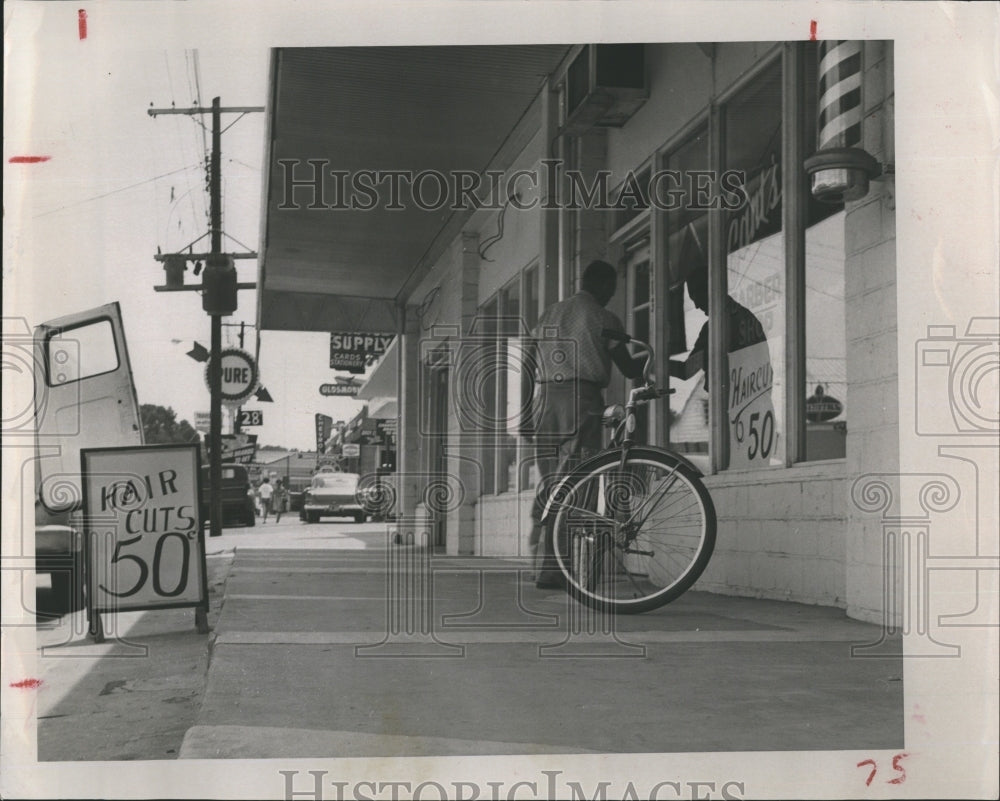 1963 Press Photo A picture of a fifty cents haircut - RSH15513 - Historic Images