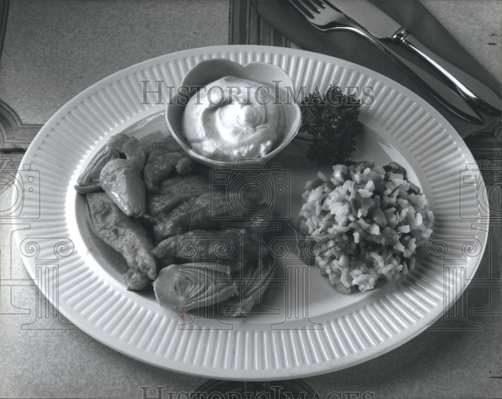 1985 Press Photo Pictured is a dish of California Chicken Curry. - Historic Images