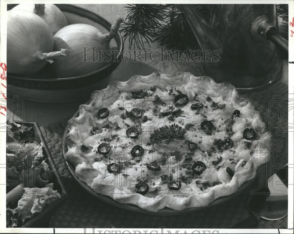 1978 This onion pie is made with Spanish onions and Swiss cheese.-Historic Images