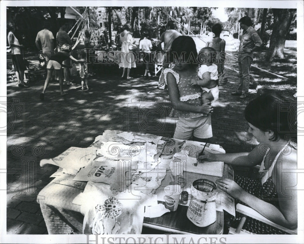 1978 Artist paint t-shirt at Suncoast Community church-Historic Images