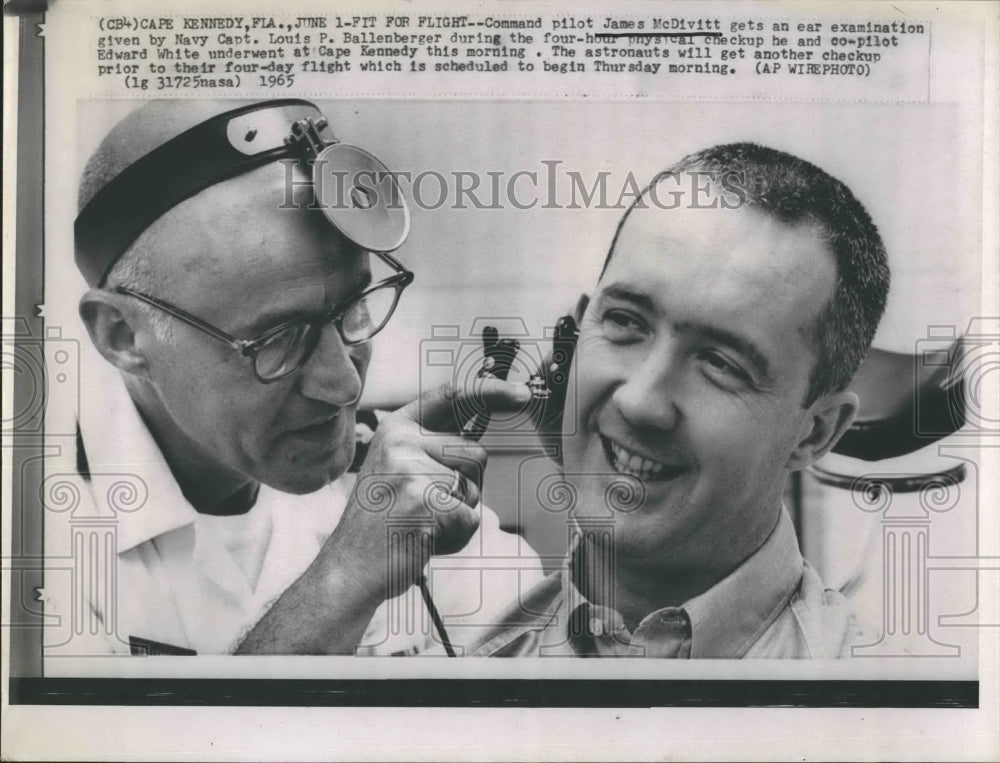 1965 Press Photo Astronaut James McDivitt Ear Examination Louis Ballenberger - Historic Images