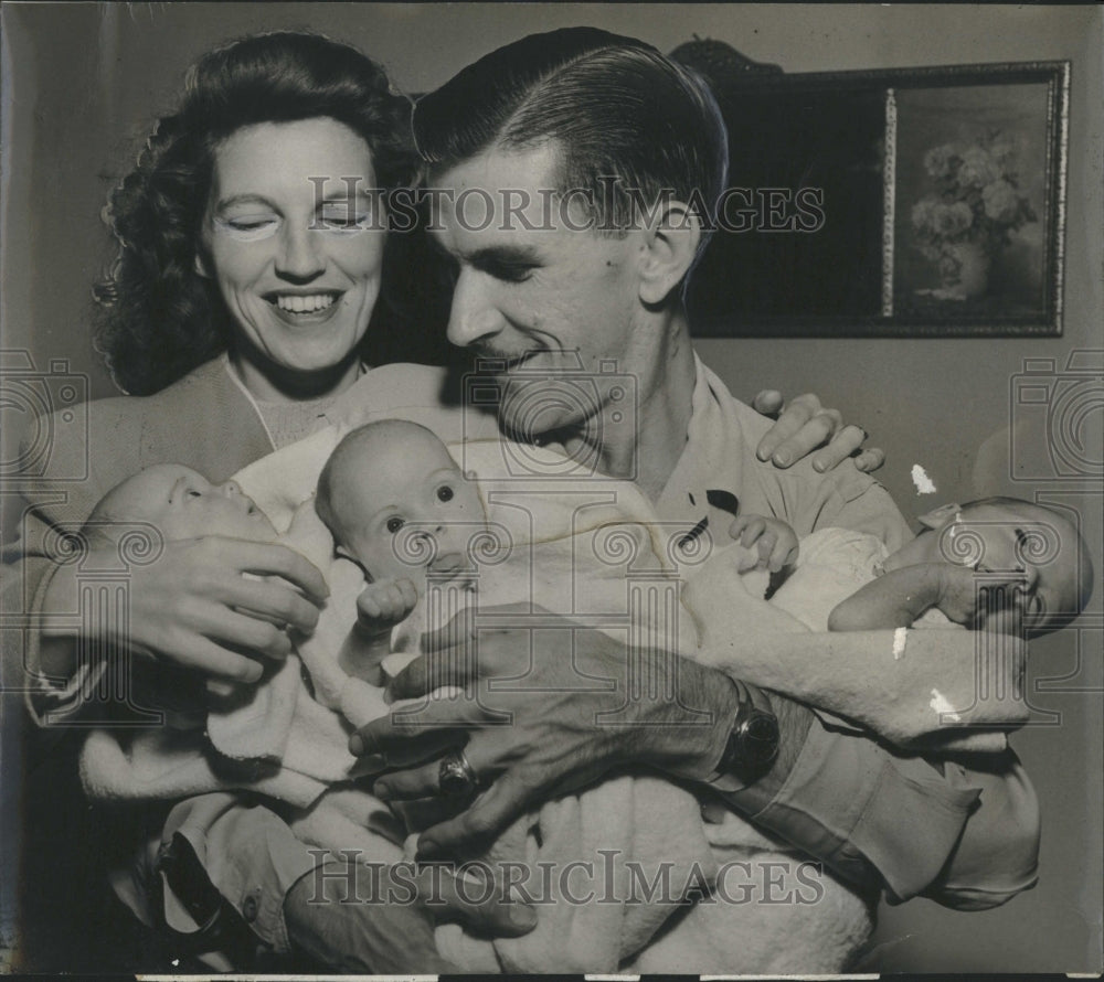 Press Photo Mr. and Mrs. L'Heureaux with the triplets babies. - Historic Images